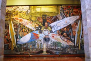 Photo : Mexico City. Palacio de Bellas Artes : Mural "El Hombre en cruce de caminos" (1934) de Diego Rivera. (Wolfgang Sauber, CC BY-SA 3.0, via Wikimedia Commons)